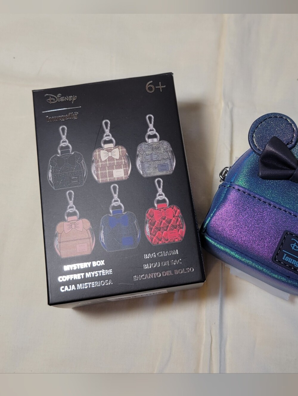 Disney Iridescent Blue-Purple Minnie Ear Key & Card Holder with Black Bow
